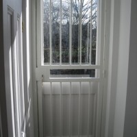 Interior fitted security bar gate